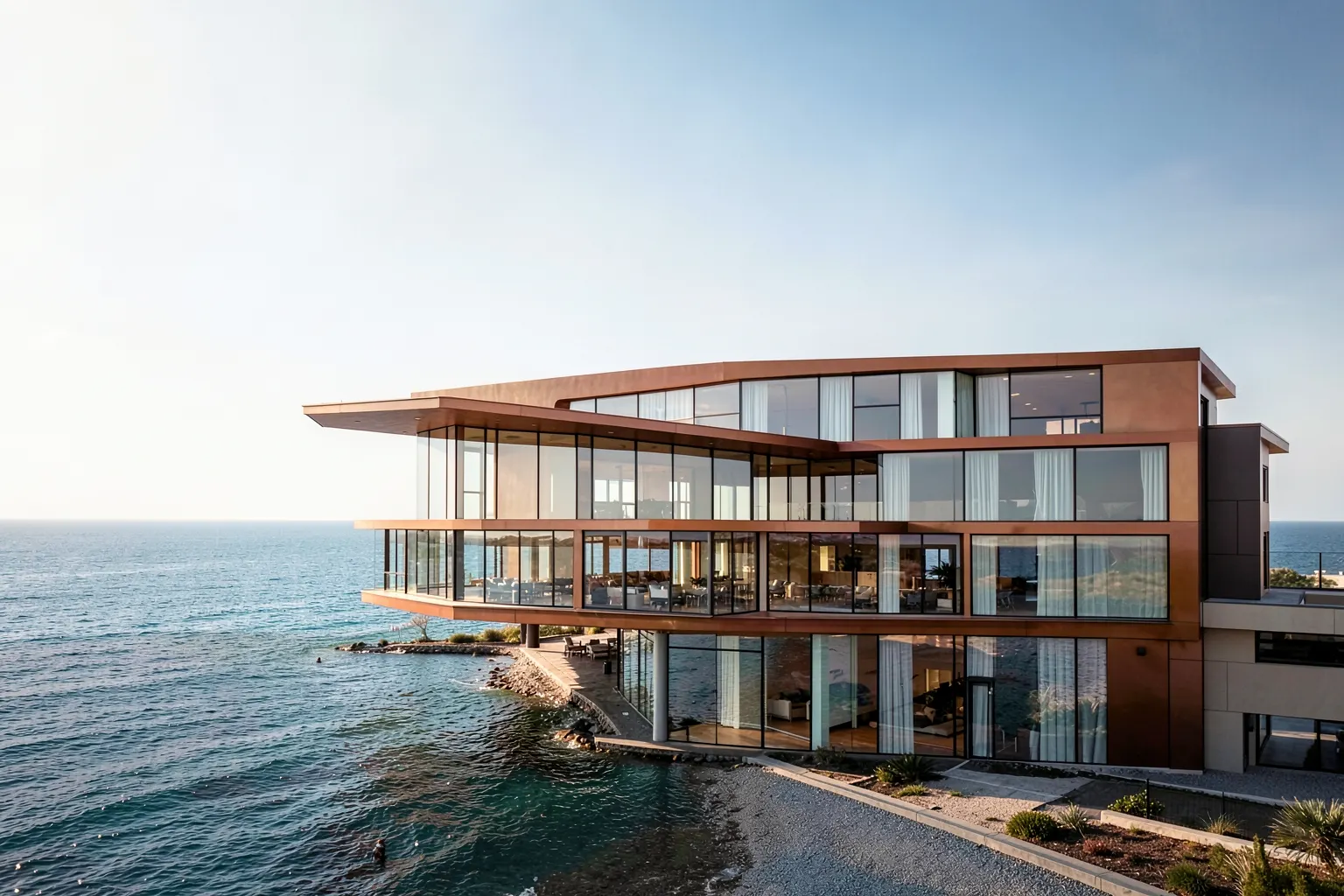 Fachada do Yachthouse com o mar ao fundo